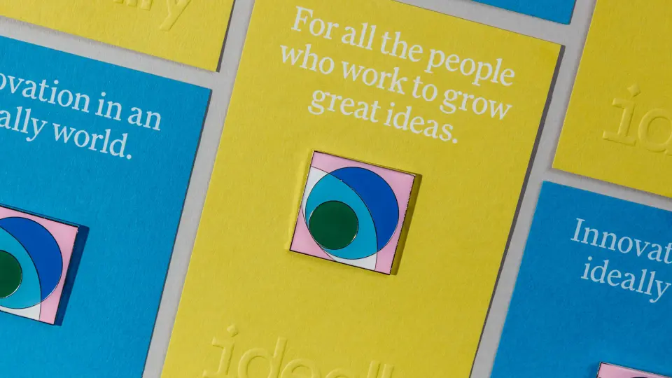 Yellow printed cards with small blue and green icons