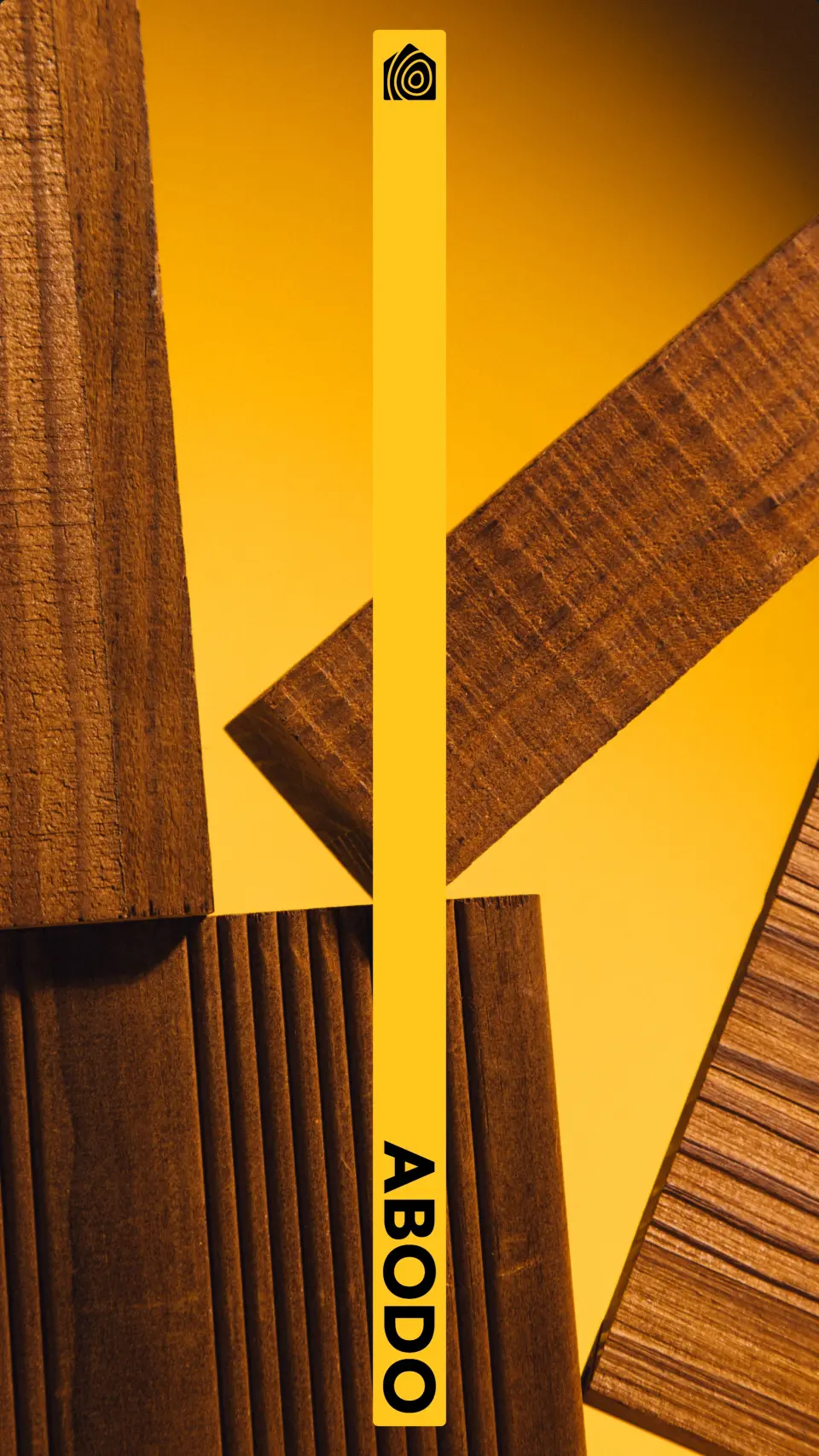 Wooden panelling and yellow geometric shapes with the Abodo wordmark