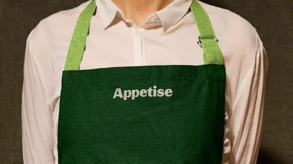 Person wearing a green Appetise apron