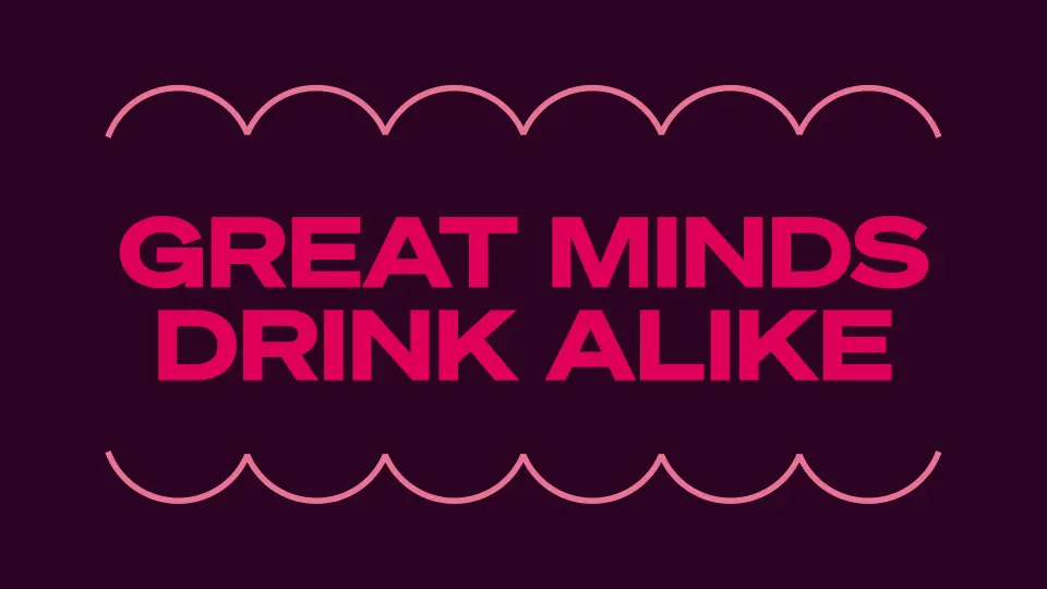 Pink text reading "Great minds drink alike" with wave lines on a dark purple background
