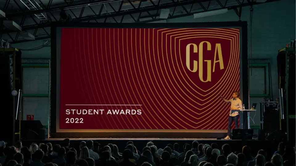 Crimson Global Academy student awards screen on a stage