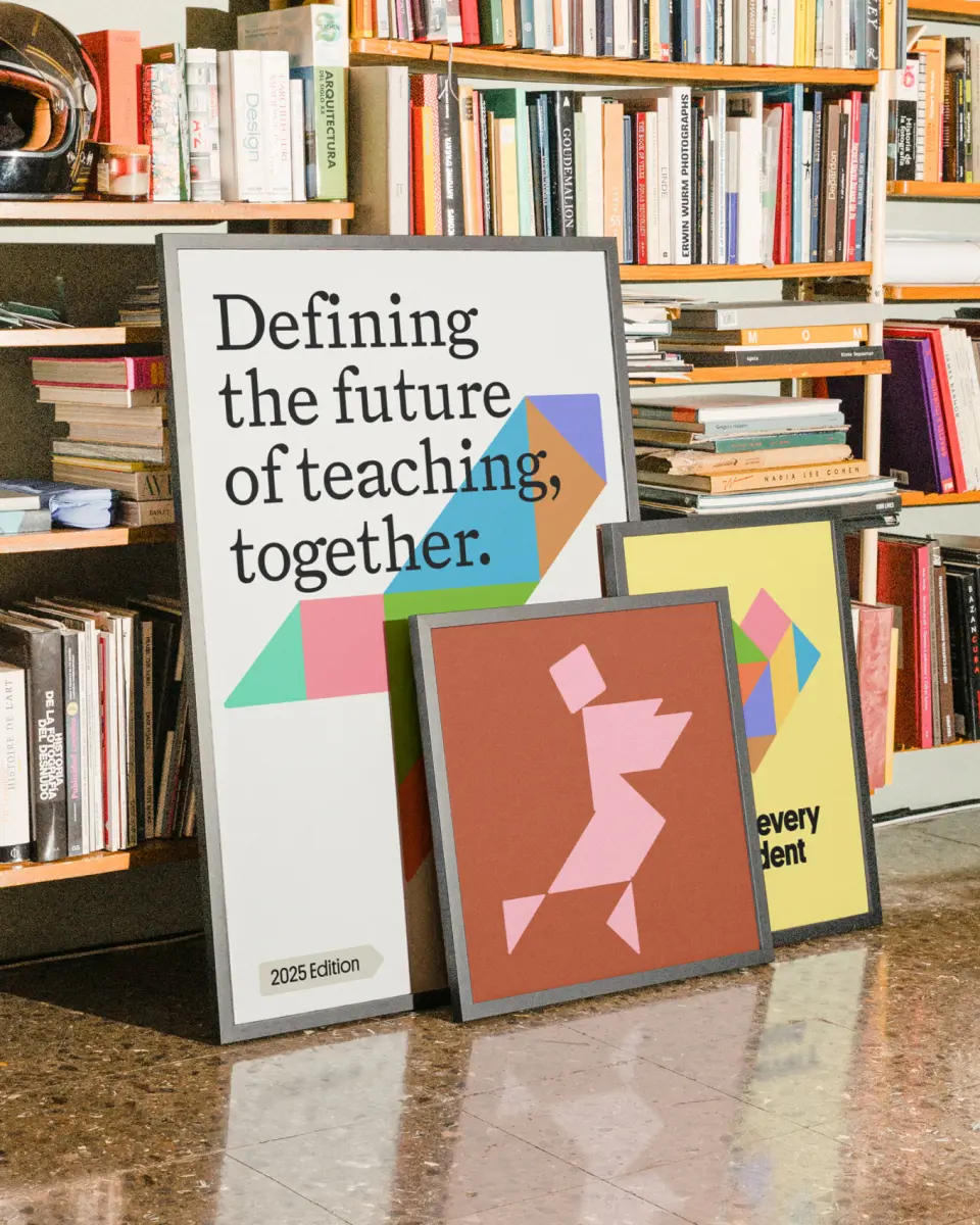 Poster “Defining the future of teaching together” on a bookshelf