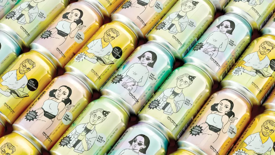 Rows of Odd Company cans with illustrated labels