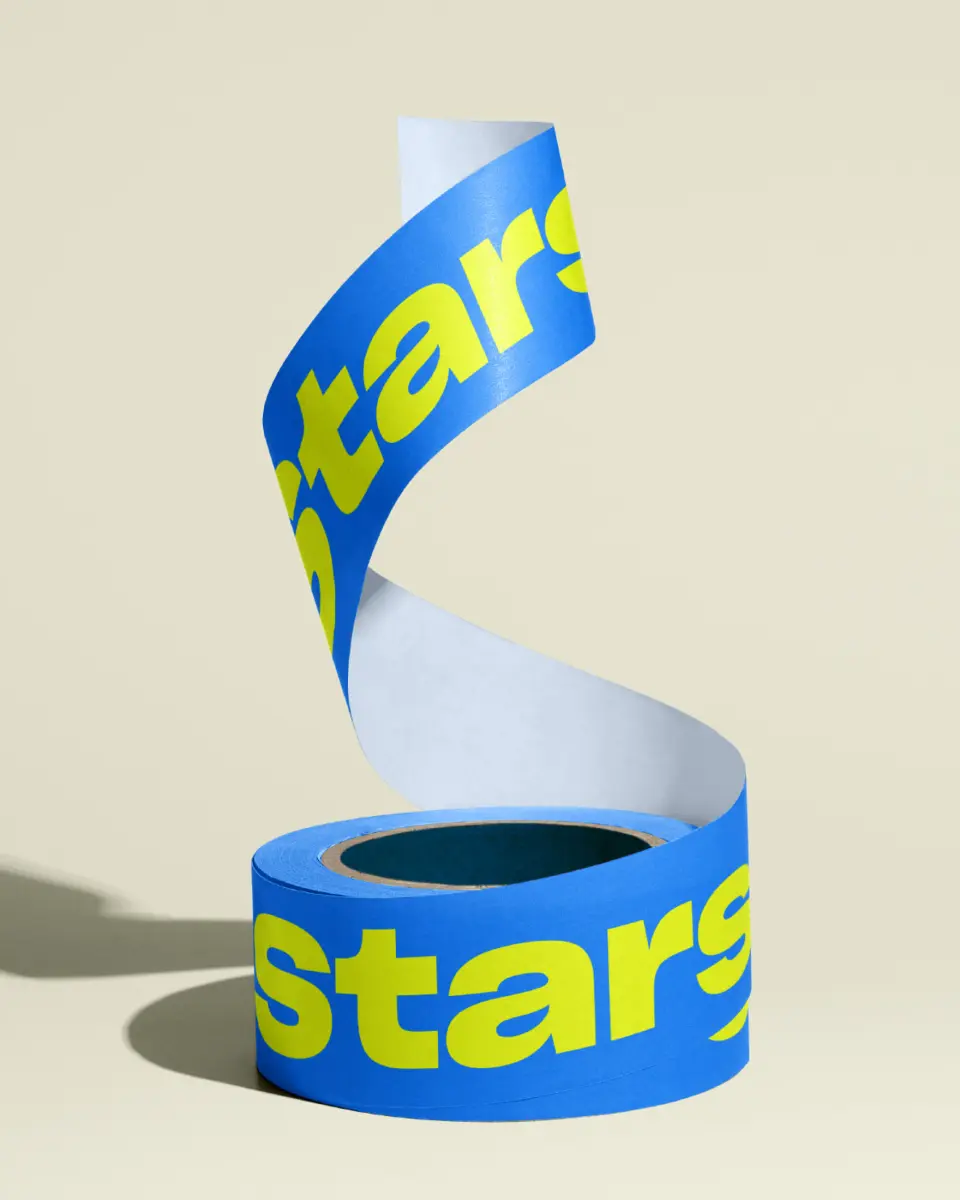 Roll of blue and yellow Starshipit tape unspooling