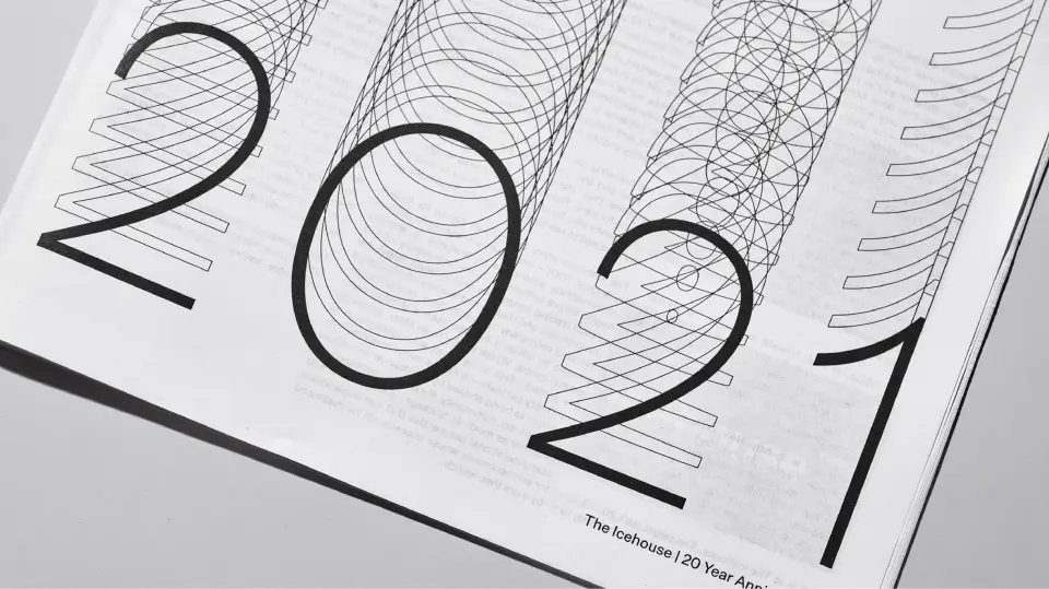Icehouse anniversary publication with large “2021” lettering