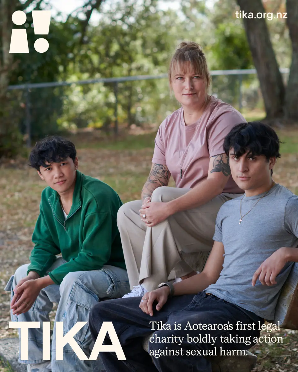 Three people sitting together outdoors with the Tika logo