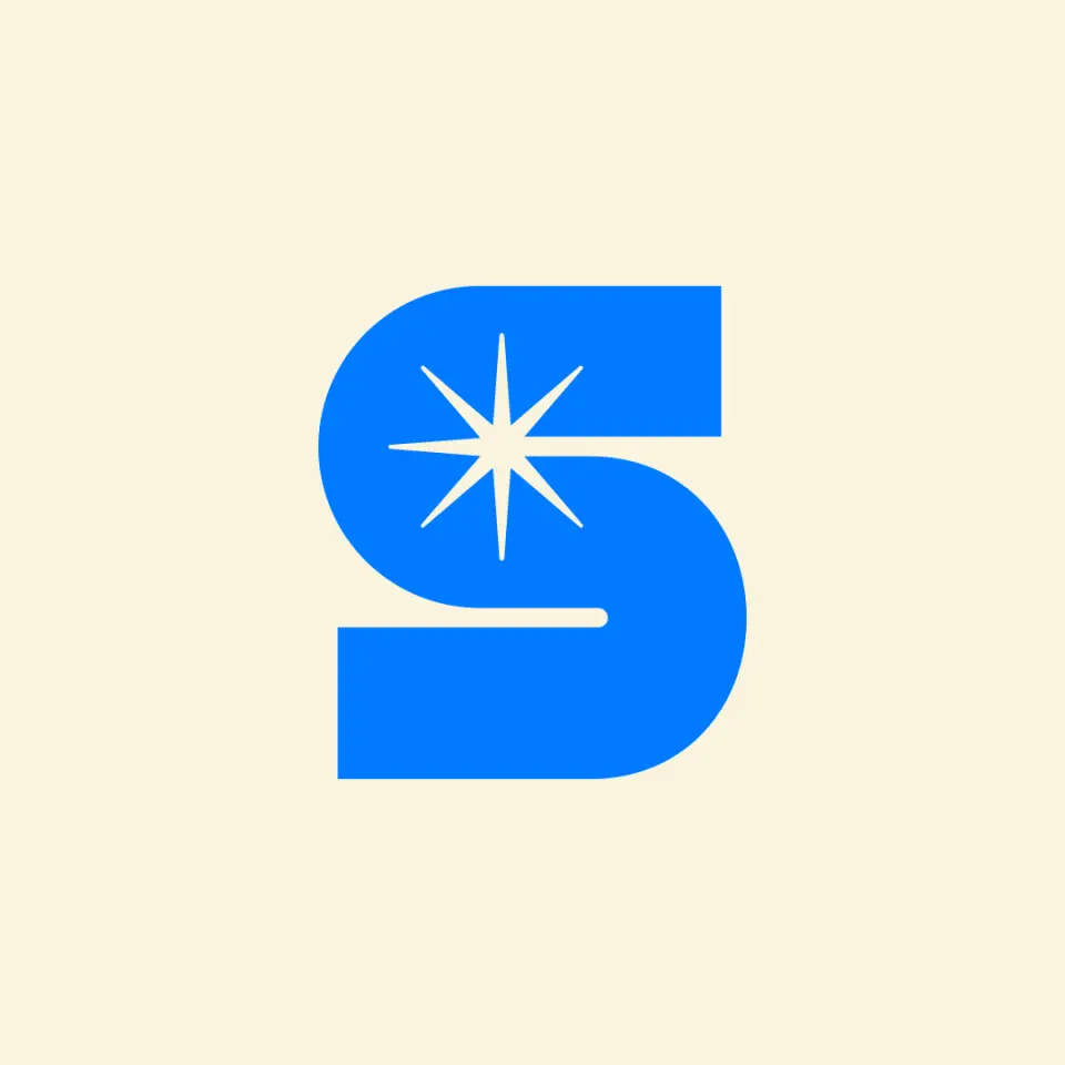 Blue Starshipit S logo with a star on a cream background
