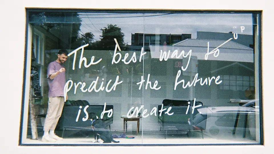 Handwritten message on a glass wall in the PU studio