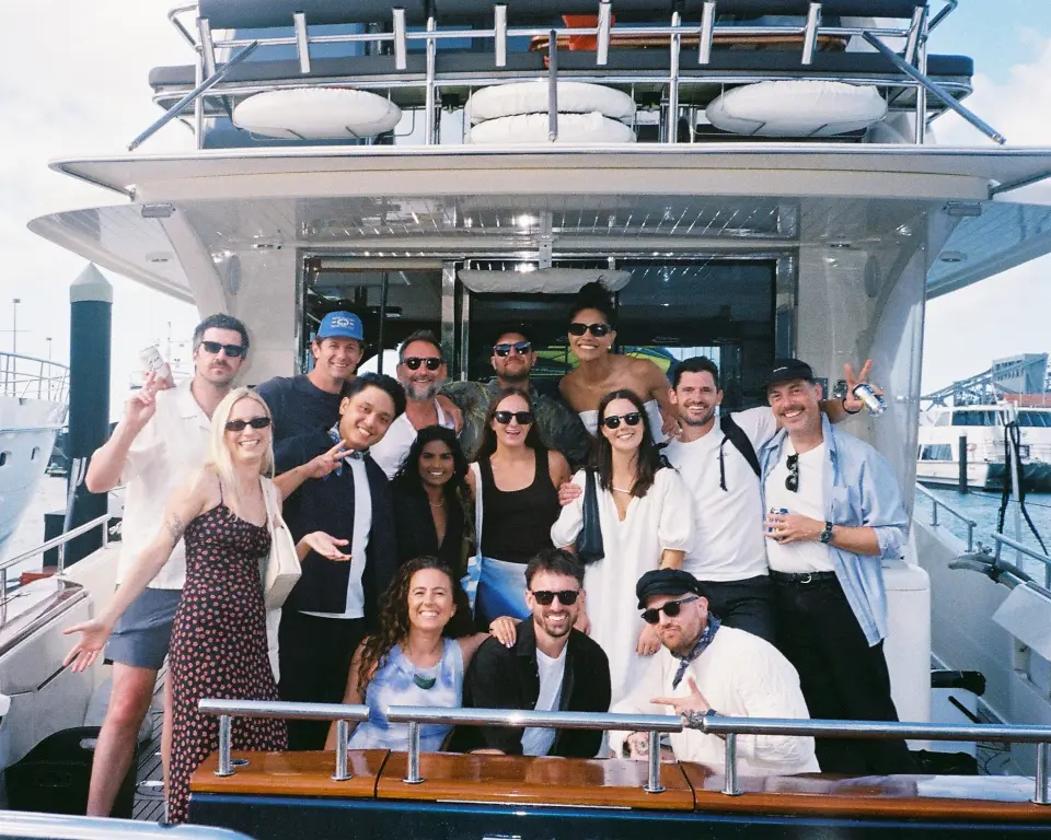 The PU team gathered on a boat