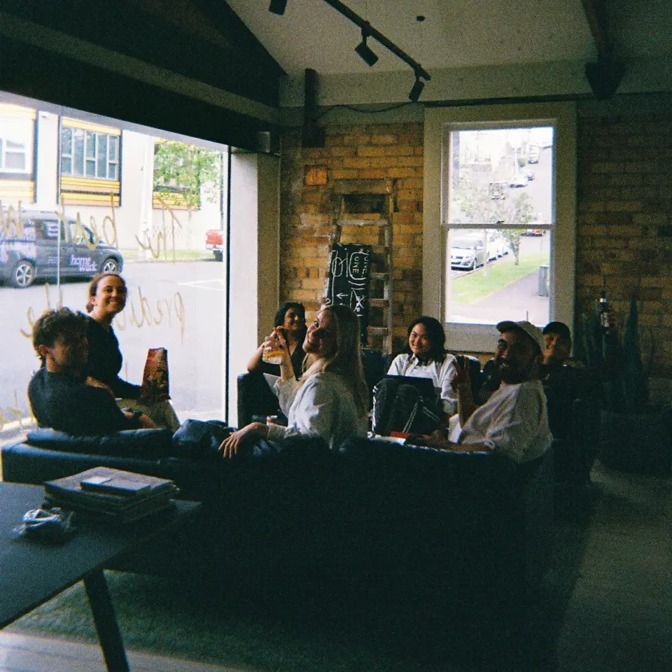 Team members sitting together in the PU studio