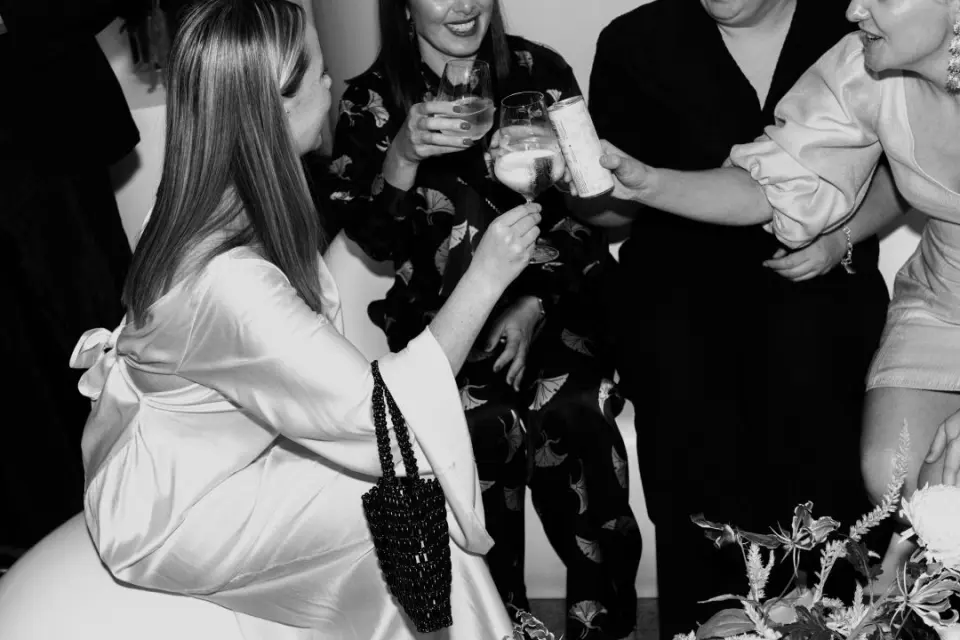 Black and white photo of people gathered at an event